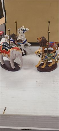 Lot of four carousel figures horse, lion, tiger, and elephant.