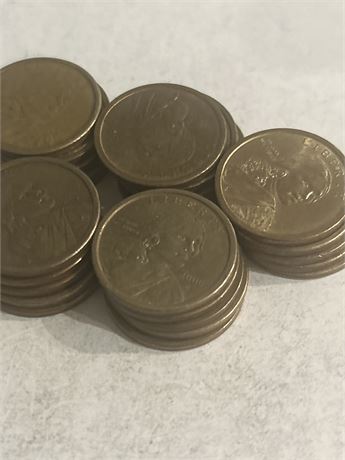 Sacagawea dollars a roll of 25 Gold (L)
