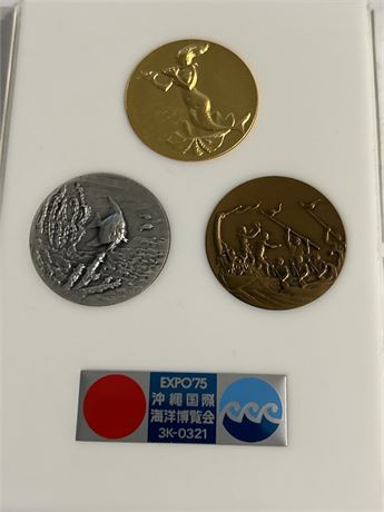 Expo 75 coin 1975 (L)