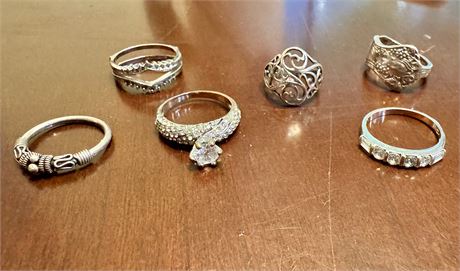 Assorted silver rings (J)